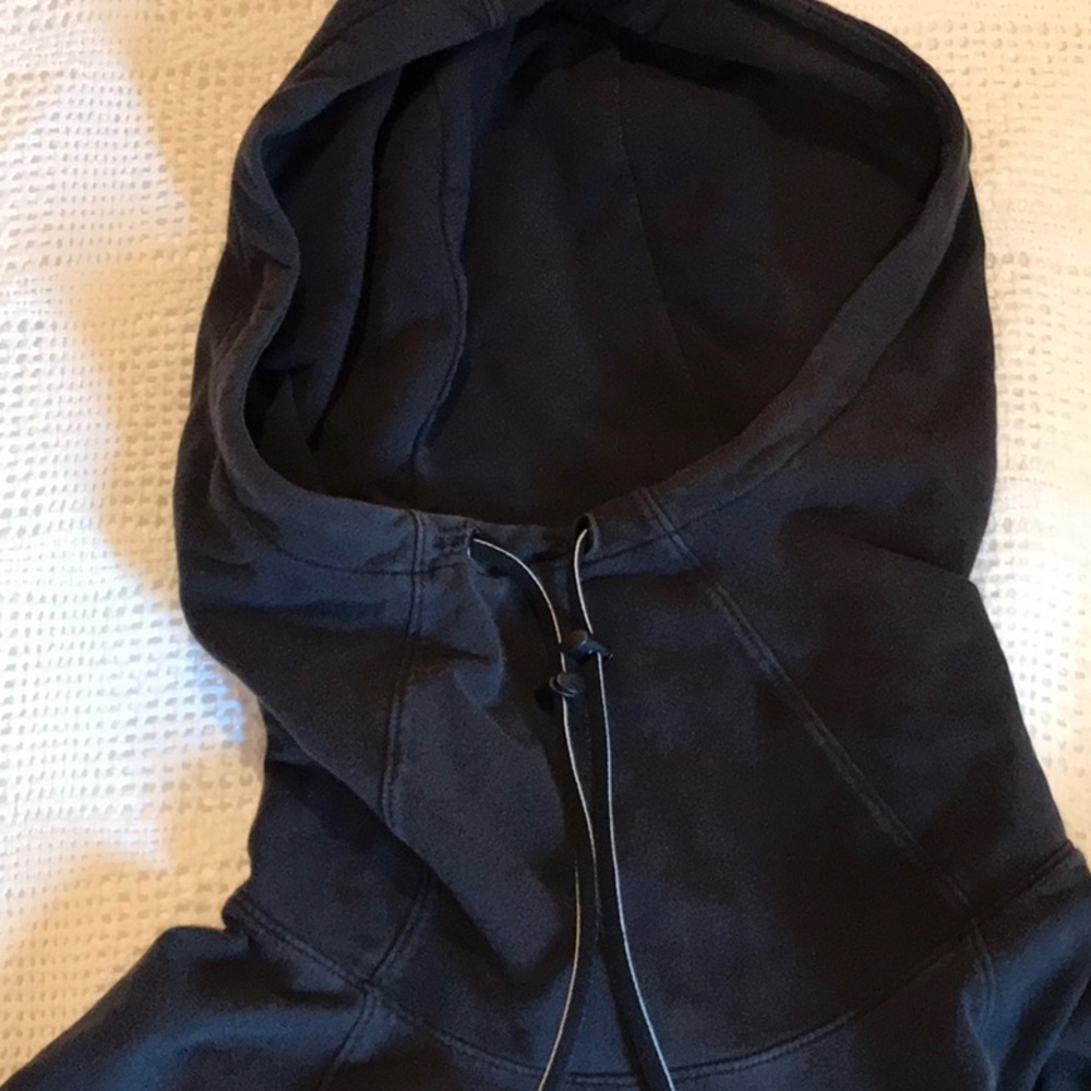 Black hoodie Athleta sweatshirt with front pouch pocket.